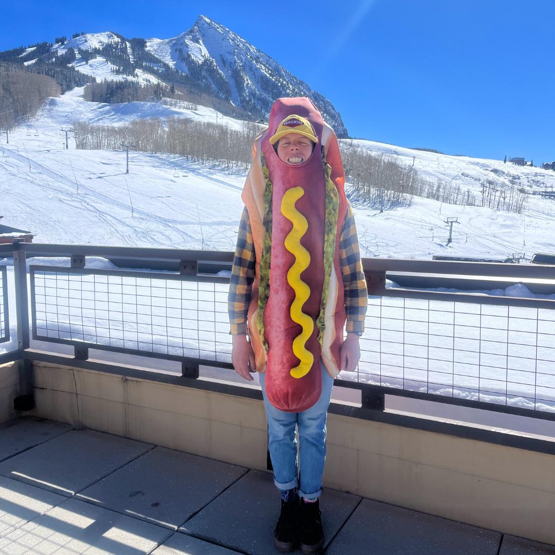A picture of Elizabeth in a hot dog costume.