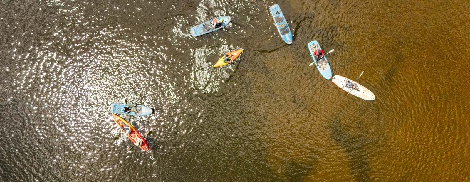 drone shot of group in lake
